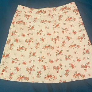 A blue flower skirt and a white rose skirt